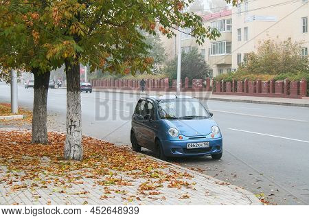 Ufa, Russia - October 10, 2010: Compact Car Daewoo Matiz In A City Street During A Strong Fog.