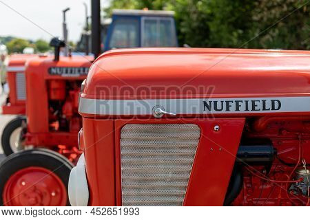 Honiton.devon.united Kingdom.july 2nd 2021.a Row Of Nuffield Tractors Is On Display At The Devon Cou