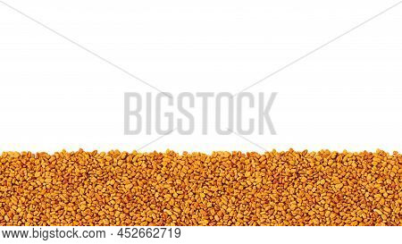 A Scattering Of Yellow Fenugreek Seeds With A White Background On Top Photo For Text And Design. Tri