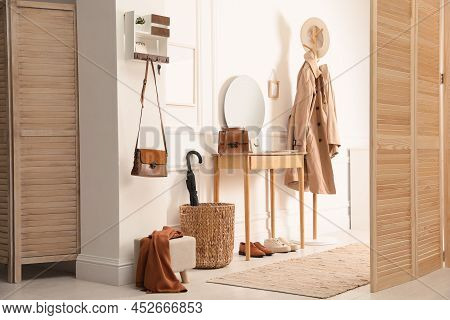 Modern Hallway Interior With Stylish Dressing Table And Key Holder