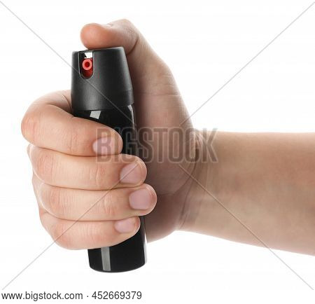 Man Holding Pepper Spray On White Background, Closeup