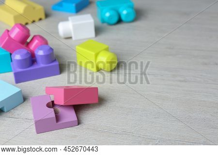 Colorful Wooden Blocks On White Table, Space For Text. Aba Therapy Concept