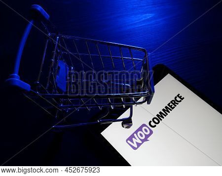 Kyiv, Ukraine - March 30, 2022. Tablet With Woocommerce Ecommerce Platform Logo.