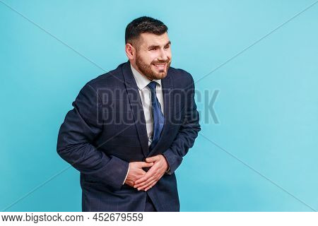 Sick Bearded Businessman Wearing Official Style Suit Holding Hands On Stomach Feeling Acute Pain, Su