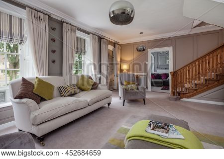 Fen Drayton, England - June 7 2018: Furnished Grand House Entrance Hall Room With Grey And White Fas
