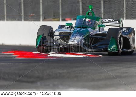 April 09, 2022 - Long Beach, California, USA: CALLUM LLOTT (R) (75) of Cambridge, England runs through the turns during a practice for the Acura Grand Prix of Long Beach at The Streets of Long Beach 