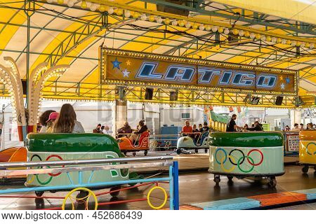 Palma De Mallorca, Spain; April 08 2022: Attractions And People At The Traditional Annual Fair, Fira