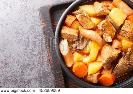 Filipino Pork Menudo Traditionally Consists Of Chunks Of Pork That Is Stewed In A Tomato Sauce Close