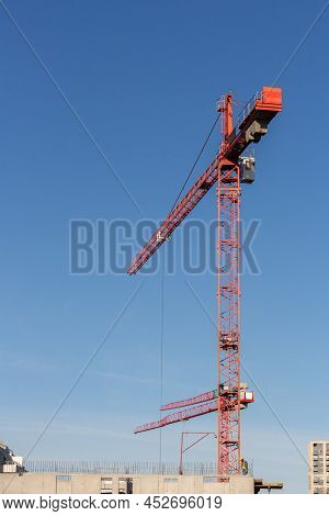 Crains On Construction Site Of Building. Construction Background Copy Space