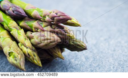 Asparagus. Fresh Green Asparagus On A Gray Slate Background. Copy Space Top View