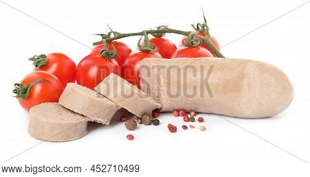 Delicious Liverwurst With Cherry Tomatoes And Spices On White Background