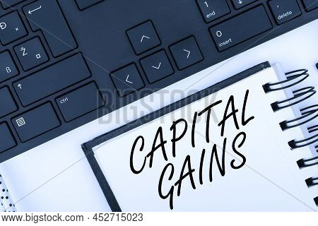Text Showing Inspiration Capital Gains. Concept Meaning Bonds Shares Stocks Profit Income Tax Invest