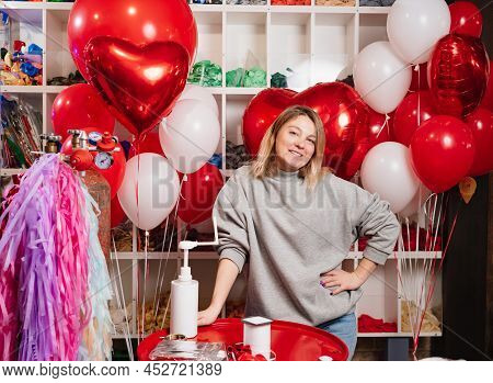Woman With Composition Of White, Red, Foil Balloons In Form Of Heart And Ball.