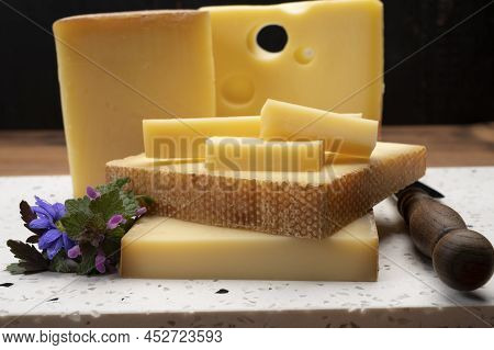 Swiss Cheese Collection, Holes Emmentaler And Gruyere Cheese Made From Unpasteurized Cow's Milk