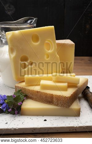 Swiss Cheese Collection, Holes Emmentaler And Gruyere Cheese Made From Unpasteurized Cow's Milk