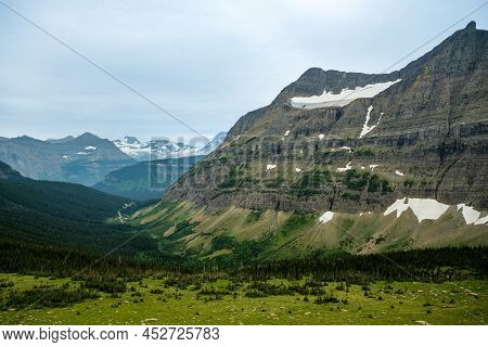 Piegan Glacier Sits High Over Siyeh Bend In Glacier National Park
