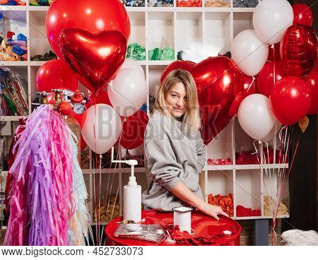 Woman With Composition Of White, Red, Foil Balloons In Form Of Heart And Ball.