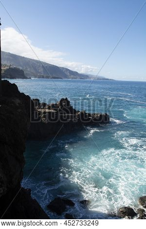 View On Black Lava Rocks In Small Village Punta Brava Near Puerto De La Cruz, Tenerife, Canary Islan