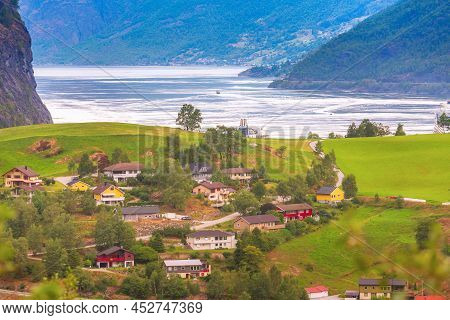 Flam, Norway, Norwegian Fjord Village With Sognefjord Landscape And Cruise Ship