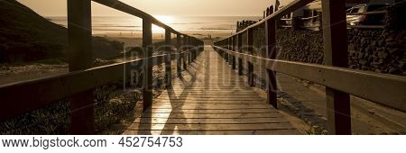Horizontal Banner Header Landscape Picture With Empty Wooden Pier And Beautiful Beach At Sunset Time
