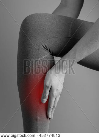 Shin Splints. Woman Holding Painful Leg With Red Point Closeup. Muscles, Tendons Inflammation, Media