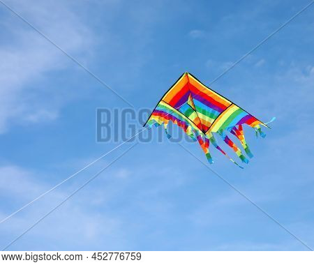 Colorful Vividly Colored Kite That I Fly In The Sky Symbol Of Parental Management That Should Hold A