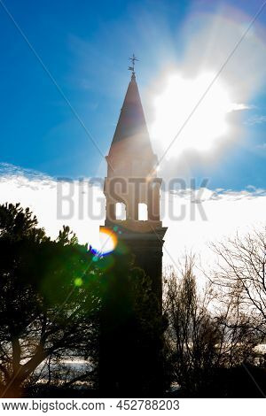 Flare Lights On The San Michele Arcangelo Bell Tower Of Mazzorbo, Venice