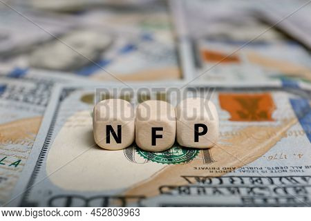 Cubes With Abbreviation Nfp On Dollar Bills