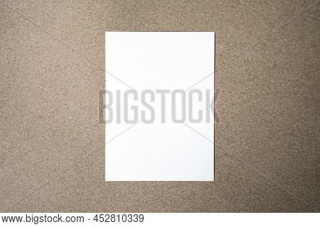 Blank Paper Sheet A3 Size On On Grey Table Background.