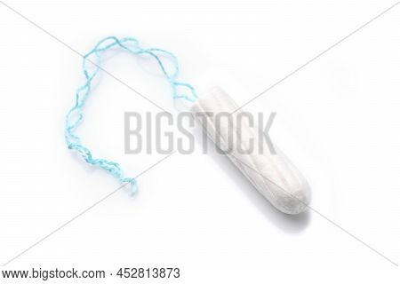 Medical Female Tampon On A Pink Background. Hygienic White Tampon For Women. Cotton Swab. Menstruati