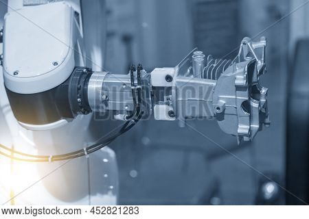 The Hi-technology  Material Handling Process By Robotic System With Cylinder Block Parts. The Automa