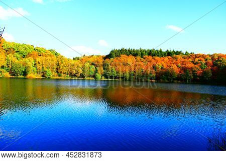 Calm Caldera Lake Holzmaar In The Eifel In Autumn