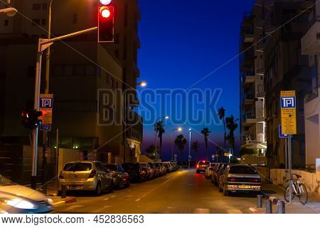 Night Traffic On The Streets Of A City In Israel. Tel Aviv, Israel - 02.14.2015