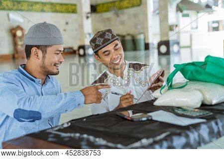 Asian Man Muslim Discussing At The Mosque
