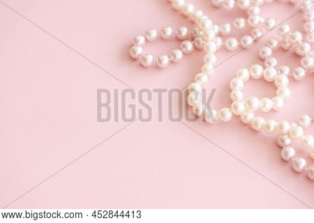 Feminine Desktop Mockup With Pearls On Pink Background With Copy Space.