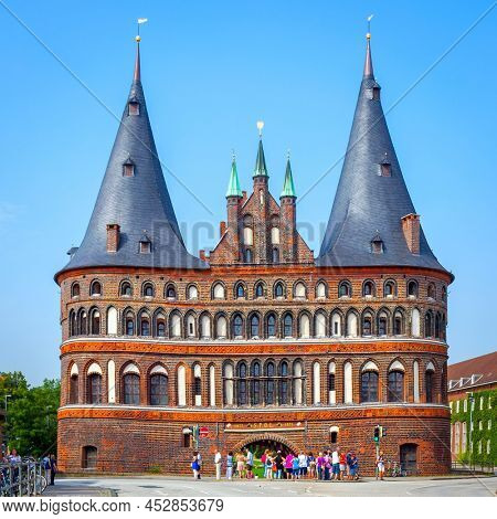 Lubeck, Germany - August 20, 2012: Holsten Gate (Holstentor) in Lubeck. Built in 1464