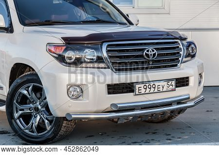 Novosibirsk, Russia - 04. 12. 2022: Front View Of Toyota Land Cruiser 200 J200 2013 Year White Color