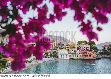 Red Blossom Oleandre Flower Of Assos Village With Colorful Traditional Houses On Kefalonia Island, G