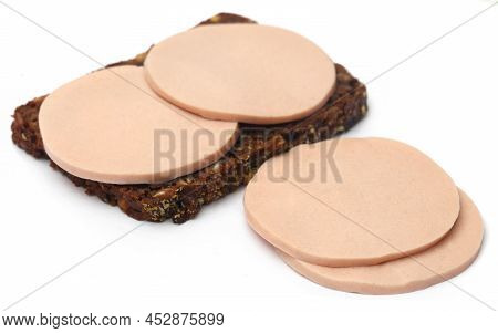 Salami On Rye Bread Over White Background