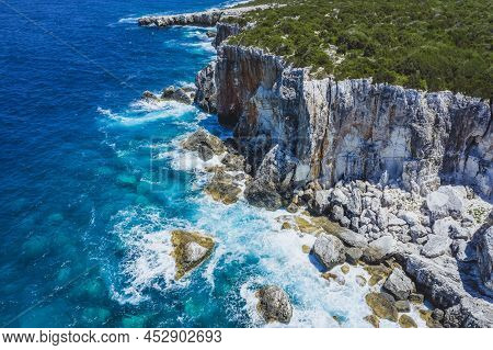 Aerial View Of Cliffs And Rocky Coastline Near Dafnoudi Beach In Kefalonia, Greece