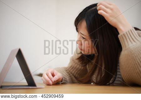 Image Of A Woman Who Cares About Her Hair