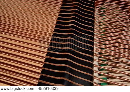 Abstract Of Piano Strings And Dampers On Grand Piano Closeup