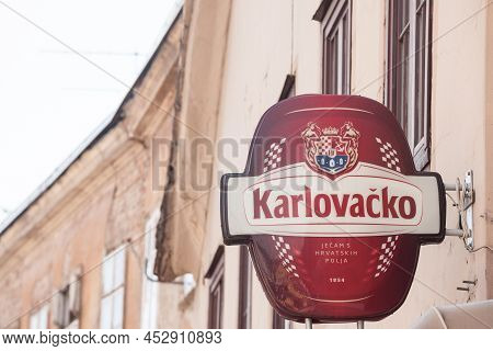 Zagreb, Croatia - June 19, 2021: Logo Of Karlovacko Pivo Beer On A Retailer Bar In Zagreb. Karlovack