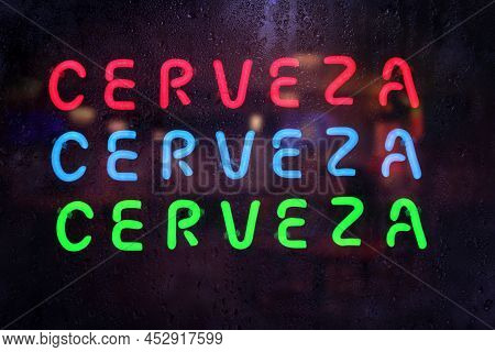 Vintage Neon Cerveza Sign In Rainy Window - Cerveza Is Spanish Word For Beer