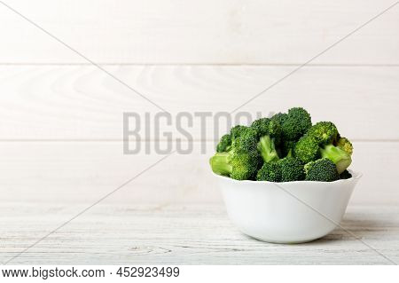 Broccoli Of Fresh Green Broccoli In Bowl Over Coloredbackground. , Close Up. Fresh Vegetable.
