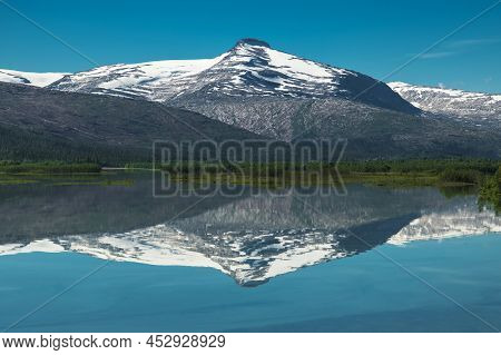 Lake Reflections In The Norwegian Nordland County Saltfjellet-svartisen National Park. Scenic Scandi