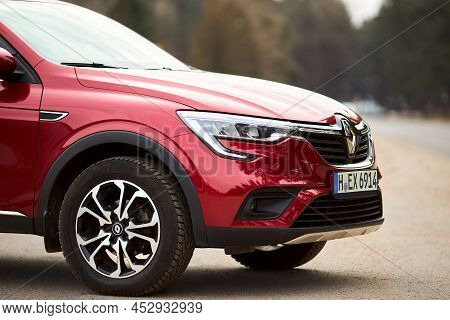 Berlin - March 2022: 2021 Renault Arkana E-tech Hybrid Suv Car Three Fourth Right Front Side View Ou