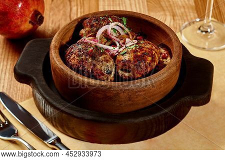 Lamb Kebab With Grilled Eggplant, Fresh Onion, Greens And Pomegranate Seeds
