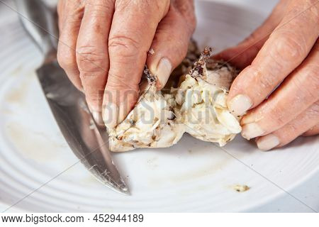 Close Up Of  The Process Of Breaking Down A Fresh Crab To Take Out The Flesh