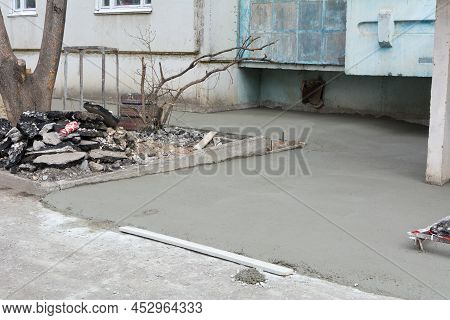 New Concrete Blind Area Apartment Building. Process Of Forming Foundation Blind Area, Concrete Pavem